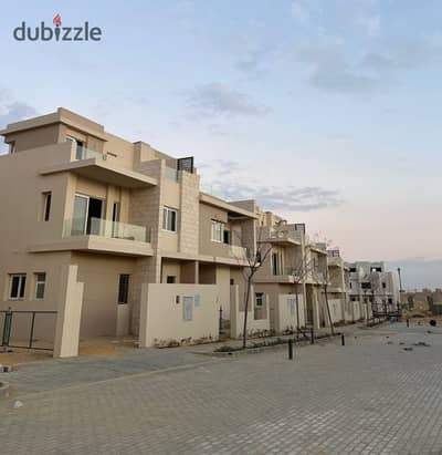 55 m Town Corner Villa for sale in Tawny October Compound next to New Giza. Immediate delivery, installments remaining