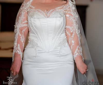 hand made wedding dress made by fashion designer