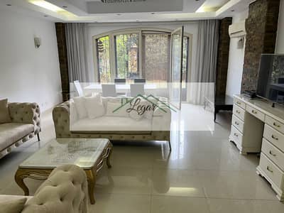 Ground floor apartment with garden for sale in Green 3, Sheikh Zayed, 170 sq m, at a bargain price.