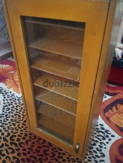 دولاب كونتر طبقات عموله باب زجاج 8رف