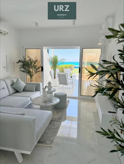Ground-floor chalet with private garden and entrance, first row with panoramic views in the North Coast. Prime location near Marassi, Hacienda, Mounta