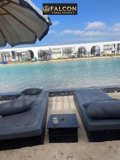 VIP chalet with a distinctive view on the lagoon in Hacienda Ras El Hekma, the strongest destination on the North Coast and the best sea on the coast,