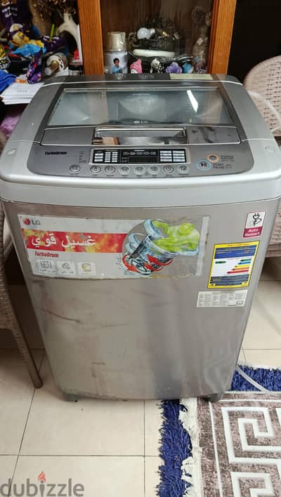 غسالة ملابس LG بالمجفف ١١ كيلو جيدة جدا