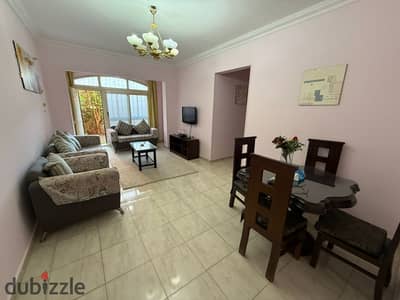 Ground floor apartment with garden for sale in Rawdat Zayed Compound, Sheikh Zayed