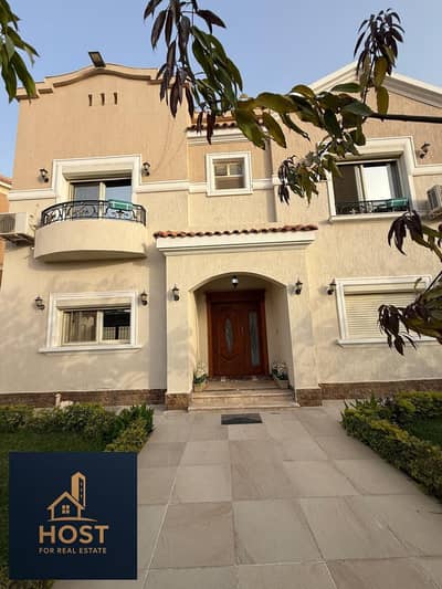 Villa for Sale with Private Garden in Le Reve Compound New Cairo The villa features a private garden and beautiful green views
