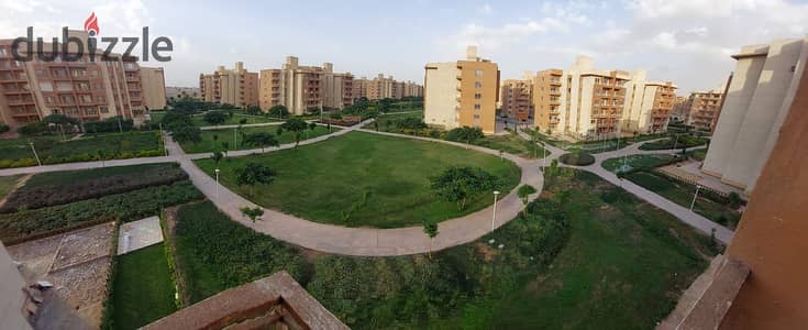 Apartment for Sale in Wesal City, Ready to Move, Wide Garden View, Prime location directly facing the gate of Wesal Club