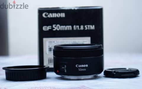 عدسه كانون 50mm1.8 stm كسر الزيرو ب العلبه للبيع
