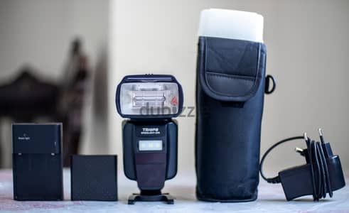 فلاش تريبو l870  ttl  حاله كسر الزيرو واضح ف الصور للبيع