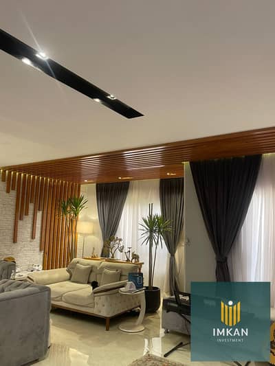 Apartment for sale in installments, 3 rooms, in Fustat, with a down payment of 600,000, in the Arabesque compound, with a distinctive sea view and gre