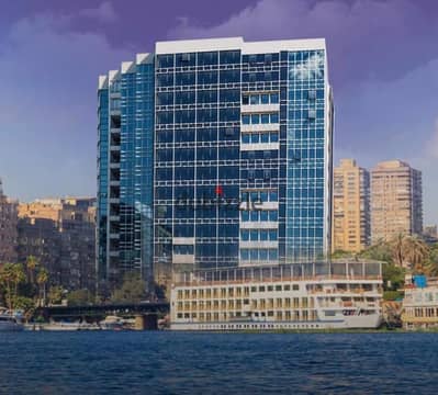 Hotel apartment with a glass facade overlooking the Nile Corniche, in a strategic location next to the Hilton Maadi Hotel.