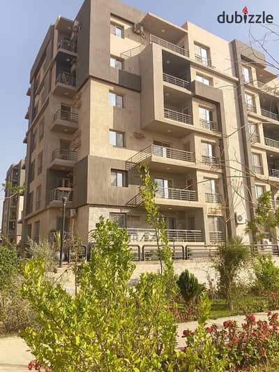 For sale, an apartment of 130 meters in a compound in Sheikh Zayed, next to Beverly Hills, fully finished with an elevator.