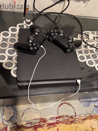 Ps4 slim 500 GB ssd with 2 original joystick and 5 CDs and bag