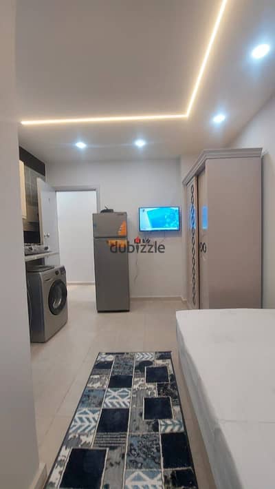 Studio for rent, air-conditioned in 6th of October City, First District, Neighborhood 3, next to Al-Hosari and the university and services, hotel-style furnishing