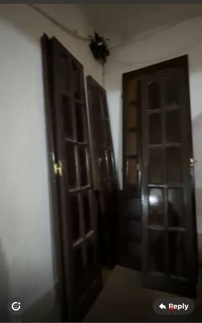 شبابيك خشب بالزجاج