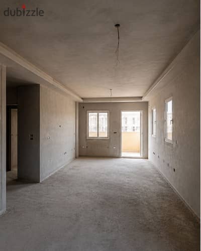 I own an apartment in a very excellent location, second number from the Suez Road and near the American University and close to the main axes - North House, Bayt Al-Watan, Fifth Settlement