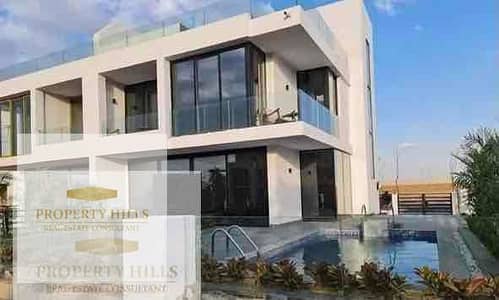 Villa for rent with a view in the heart of the golf course for a monthly payment of only 45,971 large area, a compound of villas only with a landscaped view, security and guarding all day next to Madinaty and Al Rehab