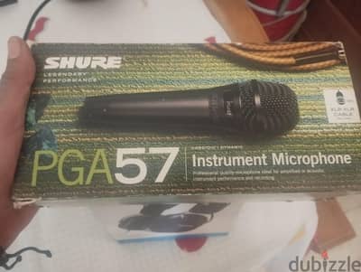 Shure PGA57 ( used once like new) + metal stand + pop filter