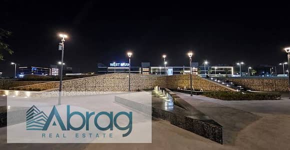 For sale: a commercial store for installment on 26 July axis directly inside West Mark Mall, Sheikh Zayed