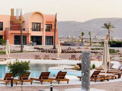 شاليه ارضي بجاردن للبيع في كماران اوراسكوم متشطب بالكامل مع التكييفات في الجونة يطل على حمام سباحة