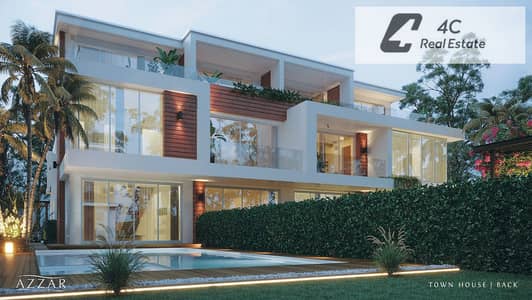 Corner townhouse resale in AZZAR-ISLAND, North Coast, with installments available for quick sale, featuring a unique layout and the lowest total price