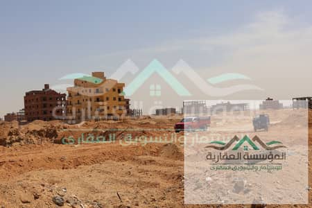 Land 600 meters for sale near the Al-Wahat Road in October, location north of the airport