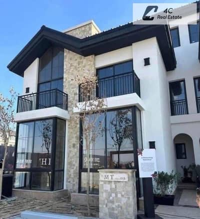 Townhouse ready to move prime location resale below market price in Marq Gardens New Cairo for sale