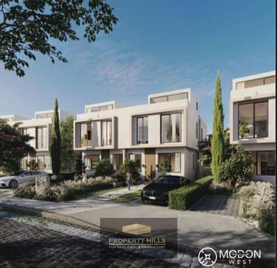 Villa Town 3 floors in October in front of Palm Hills and in front of Al-Jazeera Club