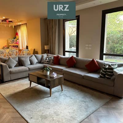 Ground floor 318 sqm apartment with private garden and open greenery view instant discount on Suez Road near AUC The Spine Towers Madinaty
