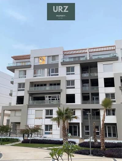Luxury apartment in New Cairo with lake view, 10-year installments or special discount on the Middle Ring Road, near Zed East, Golf Town, WAVE & Mivid