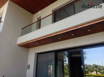 Villa with an open view of the landscape next to Swan Lake on the Dahshour road near Kiva and Palm Parks in front of the distinguished neighborhood and the first tourist village