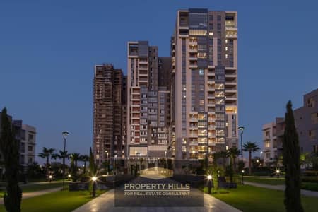 Now receiving a 246 sqm apartment with hotel finishes, air conditioning, and an open view of the courtyard in AEON Towers, Sheikh Zayed, from Marakez next to Mall of Arabia