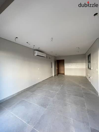 ستوديو للايجار كومباوند فليدج ويست الشيخ زايد بالتكيفات غرفة منفصلة Studio for rent - Village West Elsheikh zayed