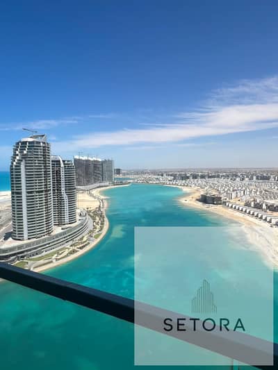 Receive immediately an (ultra super lux) apartment with hotel specifications, double view, ideal for living or investment, in front of Al Alamein Towe
