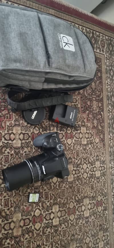nikon coolpix b600 وارد الخارج with bag& card memory 32