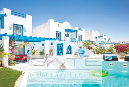 ready to move with lowest price town house in mountain view ras elhekma - 145 m2 - direct pool