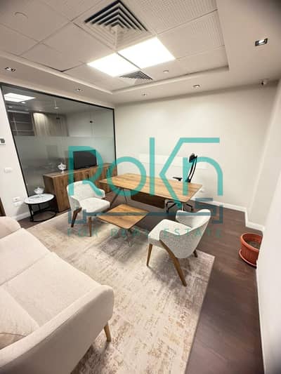 Office for rent, finished, furnished, modern, view of the plaza, Arkan Plaza, Al-Bustan Street - Central Axis