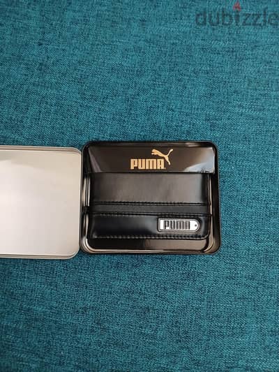 محفظة جلد رجالي (PUMA) جاية من أمريكا