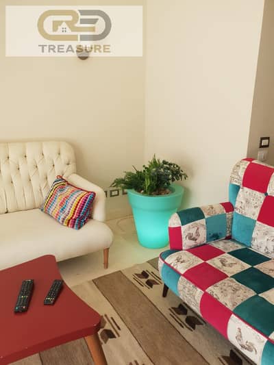 furnished Studio with garden for sale Village Gate - new cairo