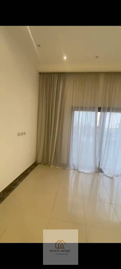 Semi-furnished studio with garden for rent in Porto New Cairo at a special price