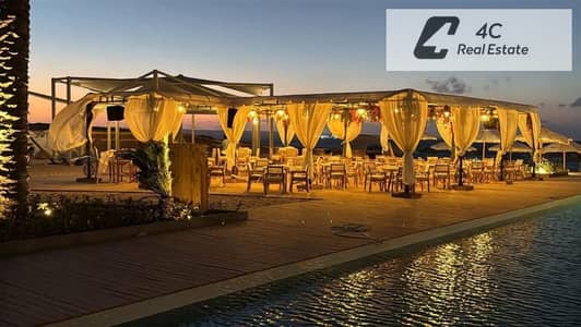 باقل من سعر الماركت لسرعه البيع شاليه  ريسيل فوريHacienda West بالم هيلزالساحل الشمالي شامل الصيانه open view landscape-بتقسيمه مميزة-جاهزللمعاينه