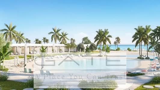 Chalet for sale in De Bay North Coast Village | Tatweer Misr Prime location, unobstructed sea view - just steps from the lagoon