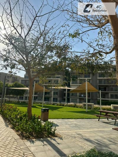 شقه 200متر ارضي بجاردن للبيع في palm hills new cairo فيو مفتوح استلام فوري