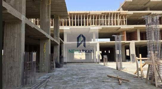 محل للبيع 34 م في اكتوبر علي محور رئيسي بمقدم 600 الف واقساط حتي 7 سنين وخصم5%