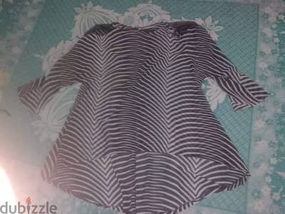 بلوزات حريمي XL بحاله جيده