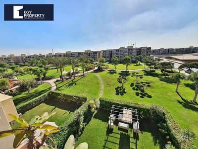 With a Prime View Fully Finished Apartment for Sale in New Giza - 6th of October City