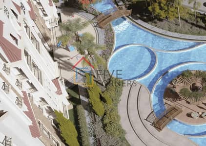 2BR apt for sale 563k DP 15% discount 10yrs interest-free installments prime location 3min from 90th St facing Il Cazar near Ring Rd
