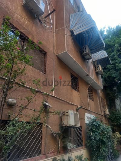 عقار بشارع الانصار بالدقي بجواد نادي الصيد