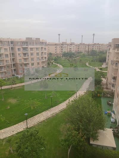 Apartment for rent, new law, in Madinaty B11 - overlooking the largest wide garden