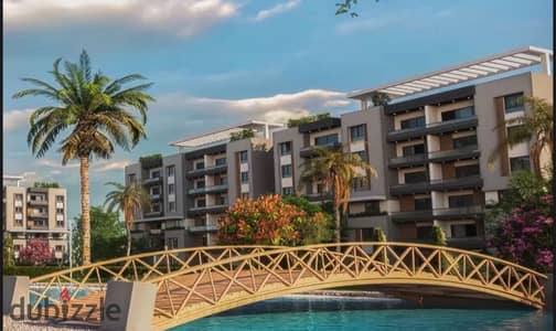 An apartment for sale with an area of 130 meters, featuring the lowest down payment and the longest payment plan, inside Flow Compound (FLW) directly on Wahat Road at the most premium location in October Gardens.