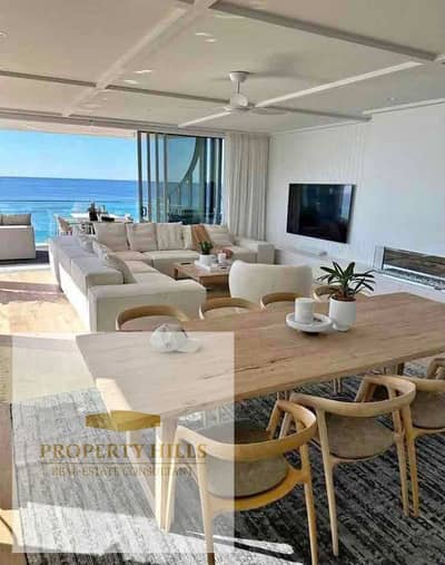 Chalet in the strongest coastal villages equipped with air conditioning and a kitchen, overlooking the lagoon and the sea in Azha Ras Al-Hikma, spacious area with installments over 10 years near Fouka Bay